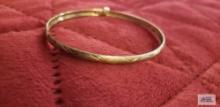 Gold colored bangle bracelet, marked 10K, approximate total weight is 1.93 G
