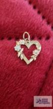 Black hills gold heart floral pendant, marked 14K, approximate total weight is 1. 05 G