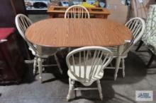 Farm style kitchen table with one leaf...and four chairs