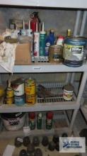 lot of caulking, door hardware, oils and etc. Shelving NOT included!