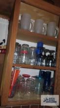Cupboard lot of assorted glassware and frosted mugs