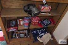 Shelving of miscellaneous including tins, vintage telephone, Richard Simmons sweating tapes, Pick Up