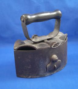 Charcoal box iron, double pointed, cast iron, Ht 7", 7 1/2" long