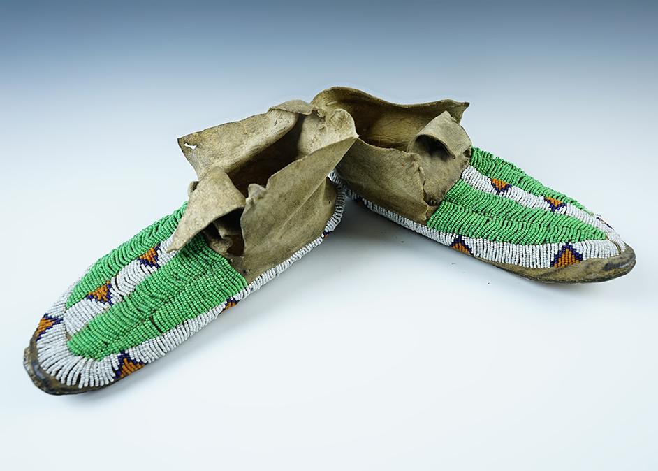 9 1/2" Pair of beaded Moccasins in nice condition for age.