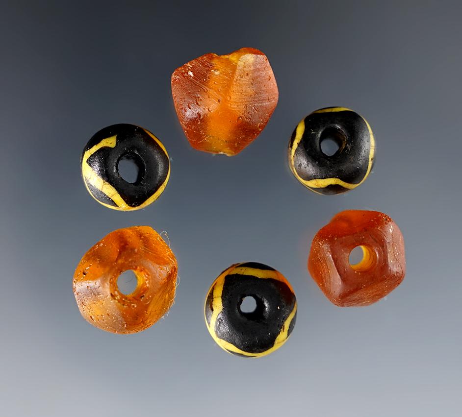 6 rare Beads. large amber faceted and large "Roman" beads. White Springs Site in Geneva, NY