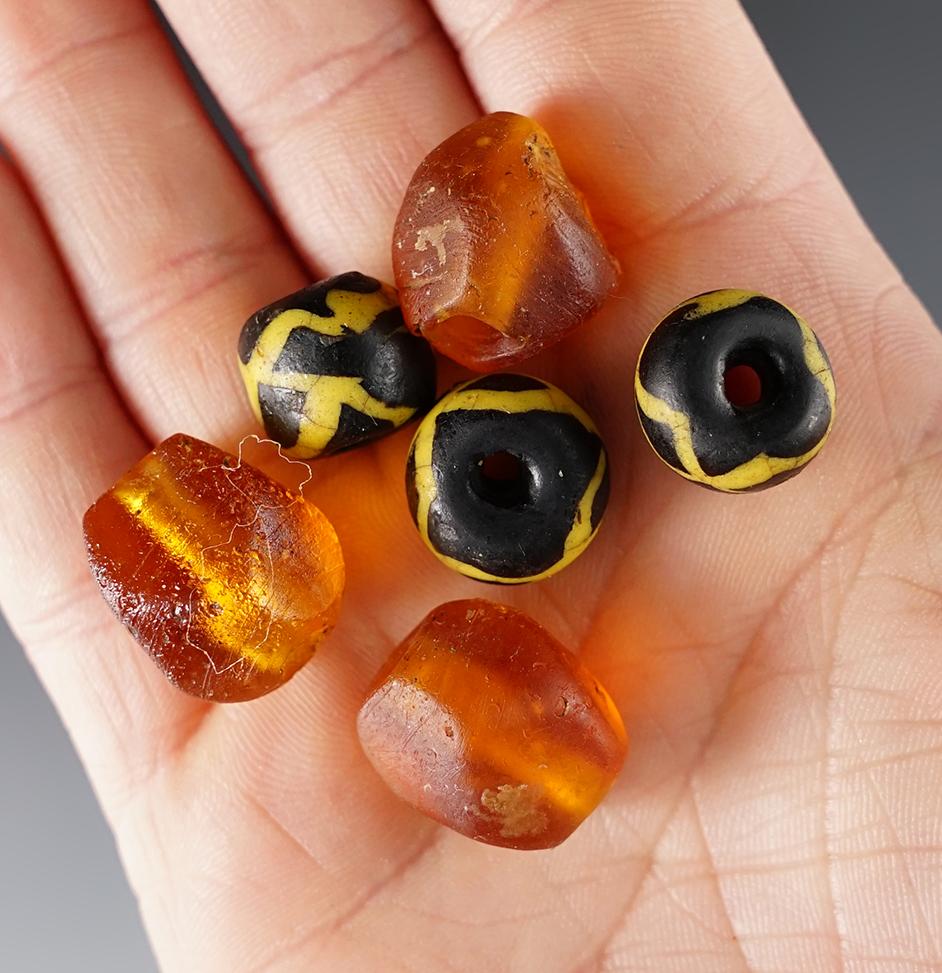 6 rare Beads. large amber faceted and large "Roman" beads. White Springs Site in Geneva, NY