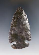 2 7/8" well made Archaic Cornernotch found in Ohio. Made from glossy Coshocton Flint.
