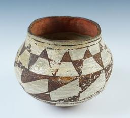 5" wide x 4 1/2" tall Acoma Polychrome Jar with a dimpled base. Ex Russell E. Morris. COA.