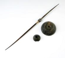 Pre-Columbian set including a spindle and two engraved sprindle whorls.
