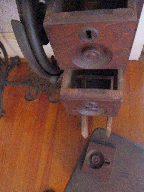 Antique Wilcox & Gibbs Peddle Sewing Machine in Wood Cabinet