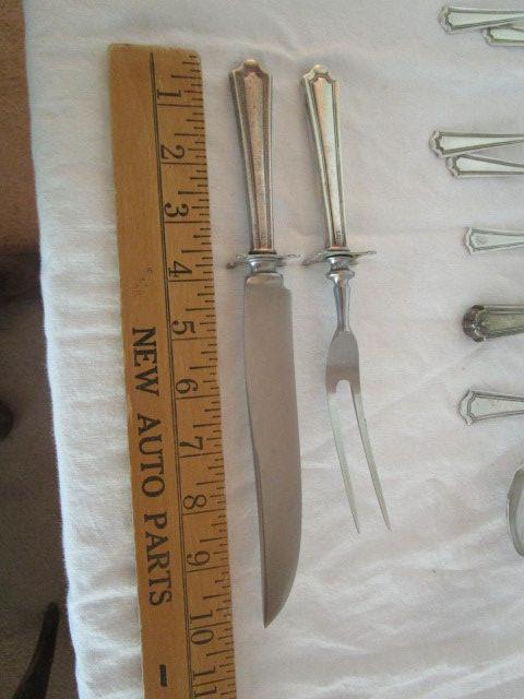12 Pieces Sterling Service Flatware and Spoons