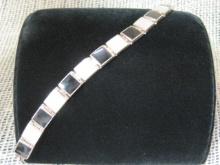 Sterling Silver 7 1/2" Bracelet with Mother of Pearl and Onyx Stones