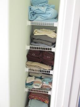 Contents of Linen Shelves-Towels, Fleece Sheet Set, Sheets, Bath Mats,