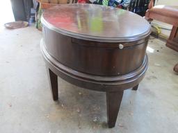 Oval Cocktail Table with Drawer and Two Pullout Trays