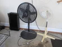 Black Lasko Oscillating Stand Fan, White Oscillating Stand Fan and Smal Electric