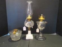 Three Clear Glass Oil Lamps-One Has Milk Glass Post