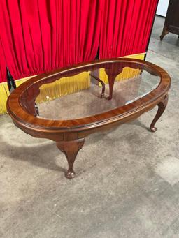 Vintage Oval Glass Topped Wooden Coffee Table w/ Cabriolet Legs. Measures 45" x 16". See pics.