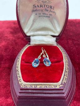 14k gold earring pair with large and gorgeous aquamarine (?) center stone with CZ accent