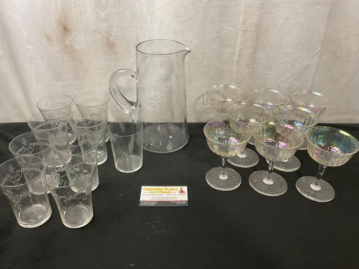Collection of Etched & Iridescent Tumblers, and Coupe Glasses, and a Starburst Etched Pitcher