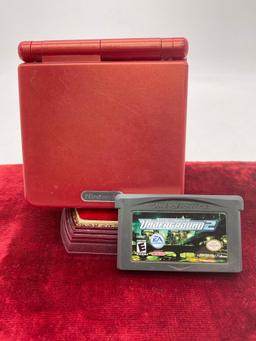Nintendo GameBoy Advance SP red handheld console with Need for Speed Underground 2