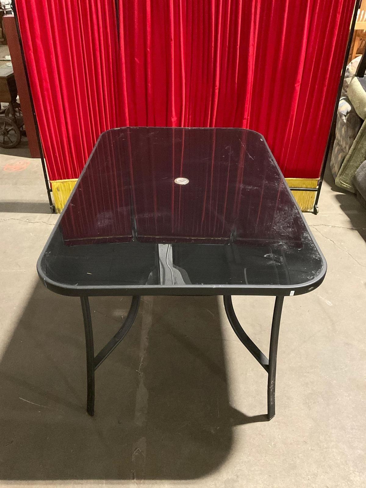 Nice Tempered Glass Metal Patio Table - In good Condition - Matches lot 54