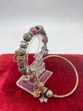Pair of Pandora charm bracelets loaded with sterling silver charms (mostly) - see pics