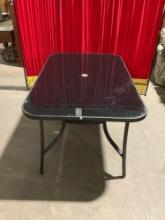Nice Tempered Glass Metal Patio Table - In good Condition - Matches lot 55