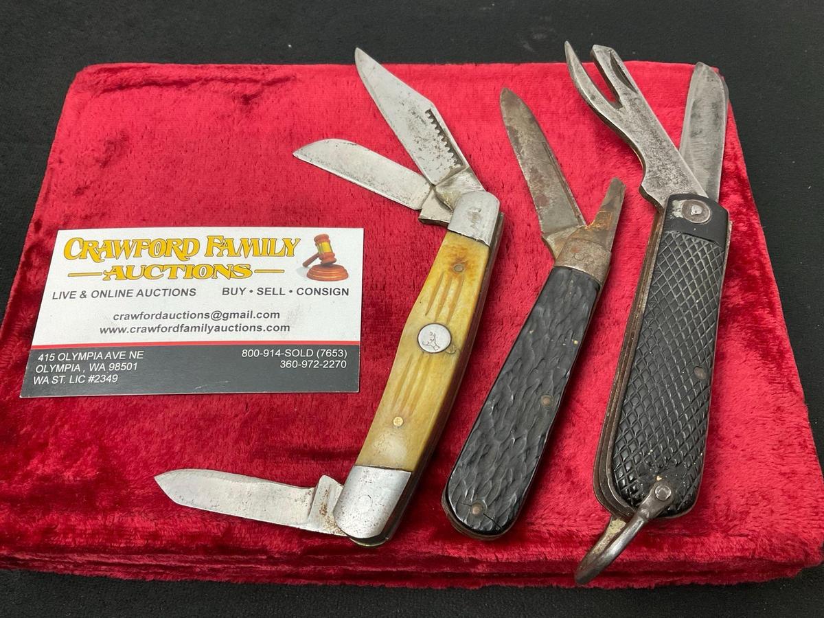 Trio of Folding Pocket Knives, D.C.C. Sheffield Camper Knife, White Tail Cutlery Stockman, Rem. R...