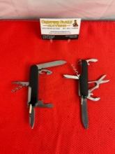 2 pcs Steel Folding Multi-Tool Swiss Army Pocket Knives. 1 Victorinox Officer Suisse, 1 Unmarked.