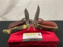 Pair of Schrade Folding Pocket Knives, models 127UH & LB7 w/ Leather Sheaths