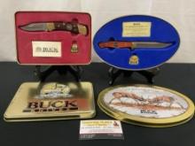 Two Tin Sets of Buck Knives, Models 112 100th Anniversary & Battling Bucks 727 Commemorative series