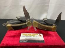 Pair of Vintage Buck 112 Folding Pocket Hunting Knives, Brass and Wooden handles