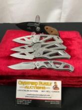 5x Gerber Folding Pocket Knives, models 3x Truss 2.0, Paraframe, 1x small knife w/ wood handle