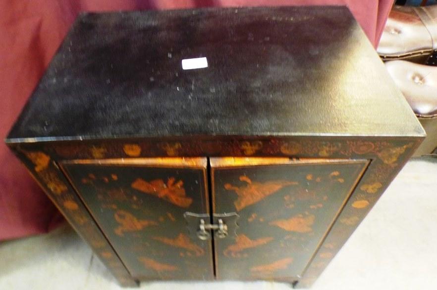 2 DOORED ASIAN COMMODE CABINET - BROWN COLORS, BLACK TOP