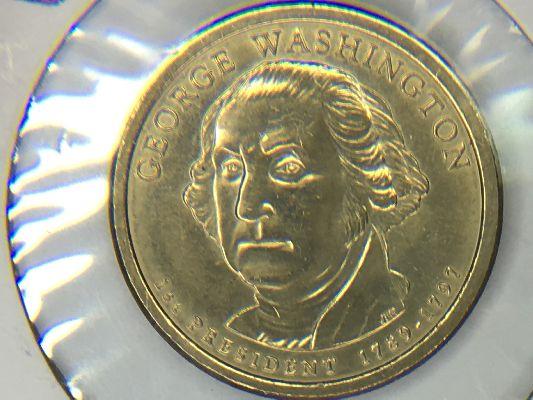 GEORGE WASHINGTON ERROR COIN.  THE DATE AND THE MINT MARK DO NOT APPEAR ON