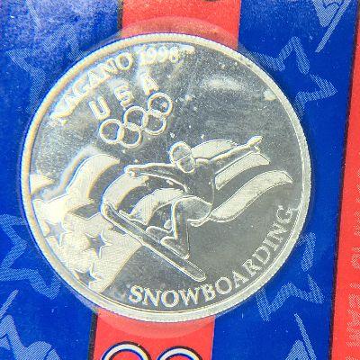 TOKENS FOR THE 1998 OLYMPICS IN JAPAN INCLUDES SPEED SKATING, SNOWNOARDING,