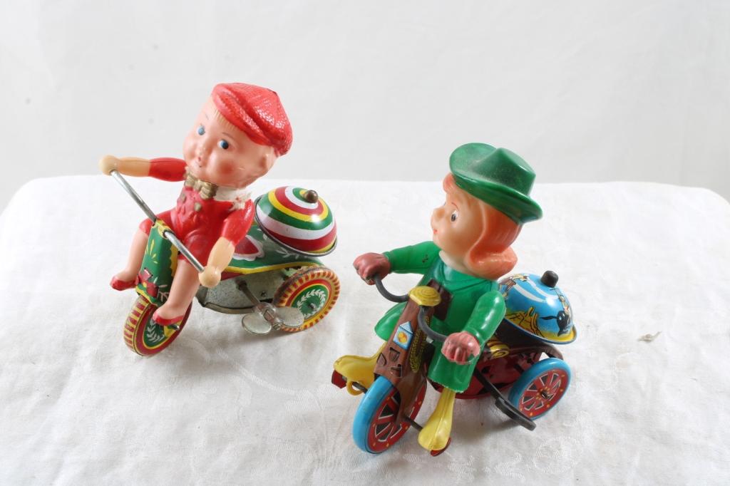 2 Wind Up Tin Toys Marx Cowgirl on Trike & Boy