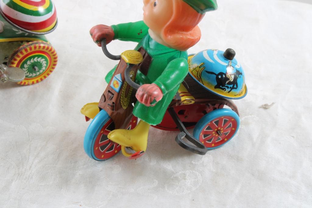 2 Wind Up Tin Toys Marx Cowgirl on Trike & Boy