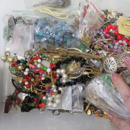 Small bin of wear and repair jewelry