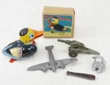 Windup Duck, Toy plane, Babe-Ruth Knife & More
