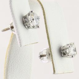 Pair of estate 14K white gold diamond stud earrings