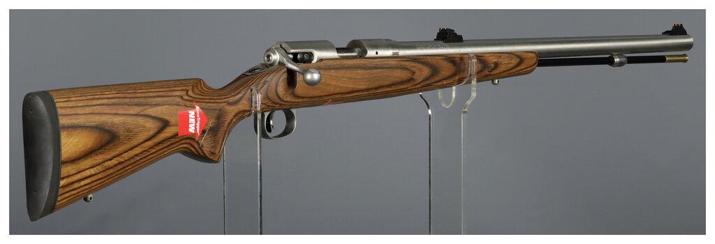 Two Muzzle Loading Rifles with Boxes