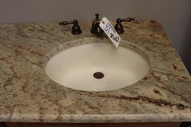 24" x 63" bathroom vanity with dual round and rectangle sinks with granite