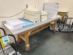 93" HOME MADE WORK BENCH WITH VARIOUS PRINTER PAPER