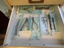 DRAWER CONSISTING OF A VARIETY OF DENTAL TOOLS