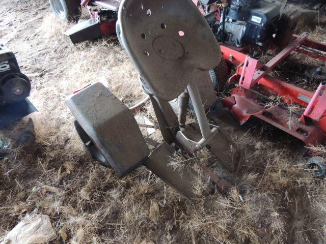 White outdoor riding lawn mower tractor, condition unknown, for parts Toro