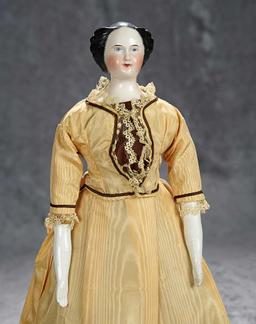 16" German porcelain lady doll with rare coiffure. $600/900