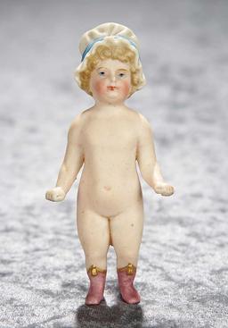 4" German all-bisque miniature doll with sculpted ruffled bonnet, rare pink ankle boots. $200/400