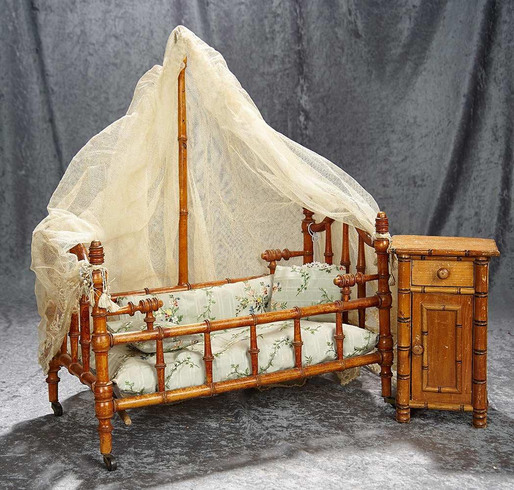 17"l. French maple wood doll's bed with canopy along with matching nightstand. $300/500