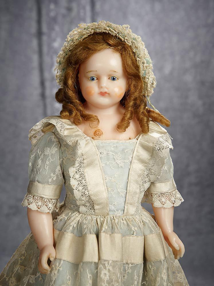 20" English poured wax doll with Montanari body stamp and lovely antique costume. $700/900